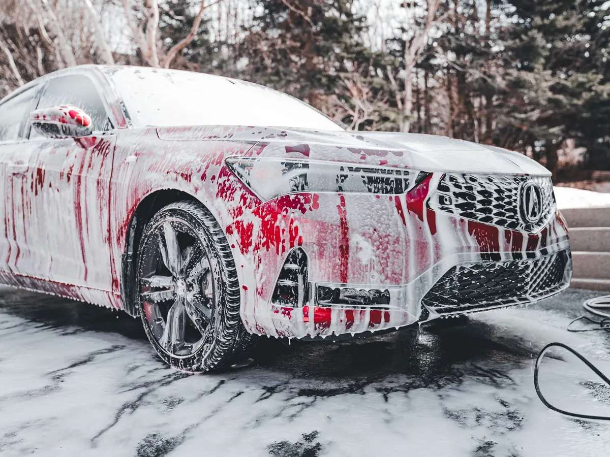 Car covered in foam during a wash